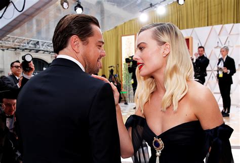 margot robbie teases leonardo dicaprio.